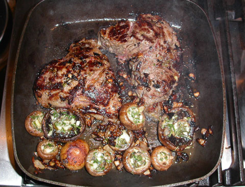 Photo of Chateaubriand with rosemary garlic mushrooms just finished cooking copyright 2004 Owen Linderholm